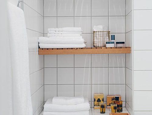 Badkamer met turquoise mozaïek vloer