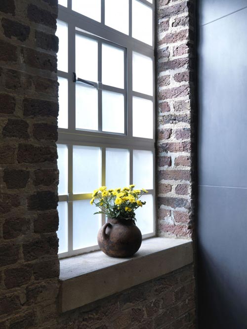 Industriële badkamer met moderne afwerking 