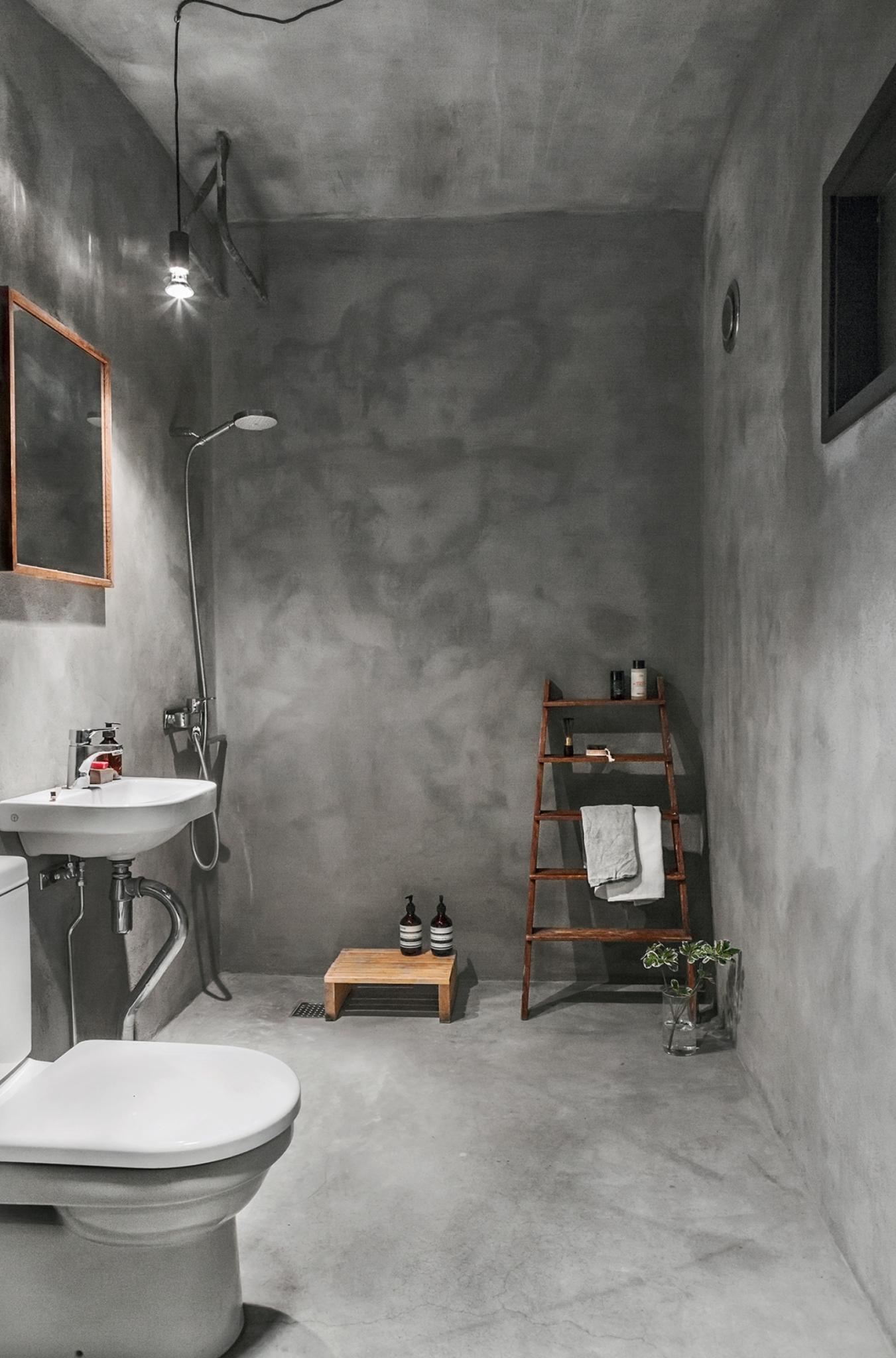 Minimalistische betonlook badkamer