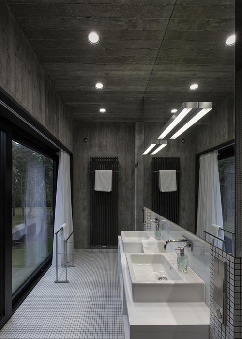 Moderne badkamer met veel beton
