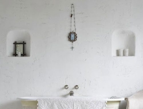 Rustieke badkamer met bad op pootjes