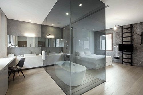 Slaapkamer en badkamer scheiden met glazen kubus