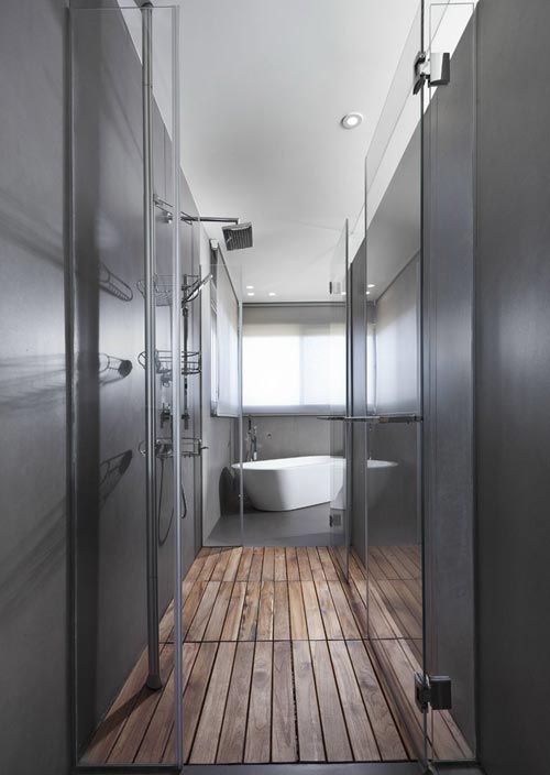Strakke grijze badkamer in penthouse