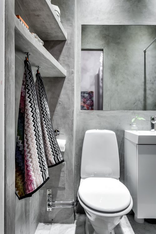 Tip voor een kleine badkamer: betonstuc!